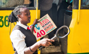 Woman in Nairobi Matatu (bus) sector